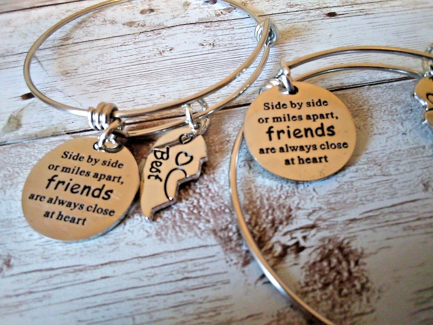 Engraved friendship bracelet featuring 'Side by side or miles apart' quote