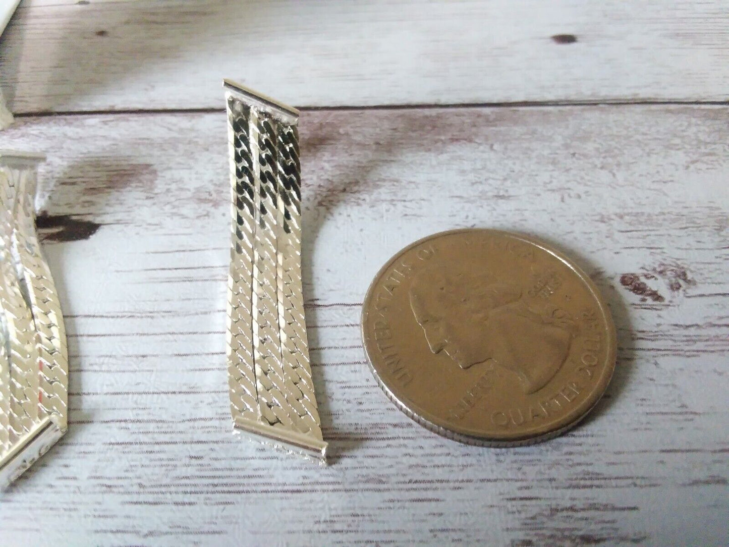 Close-up of Silver-Plated Earrings featuring a triple herringbone chain