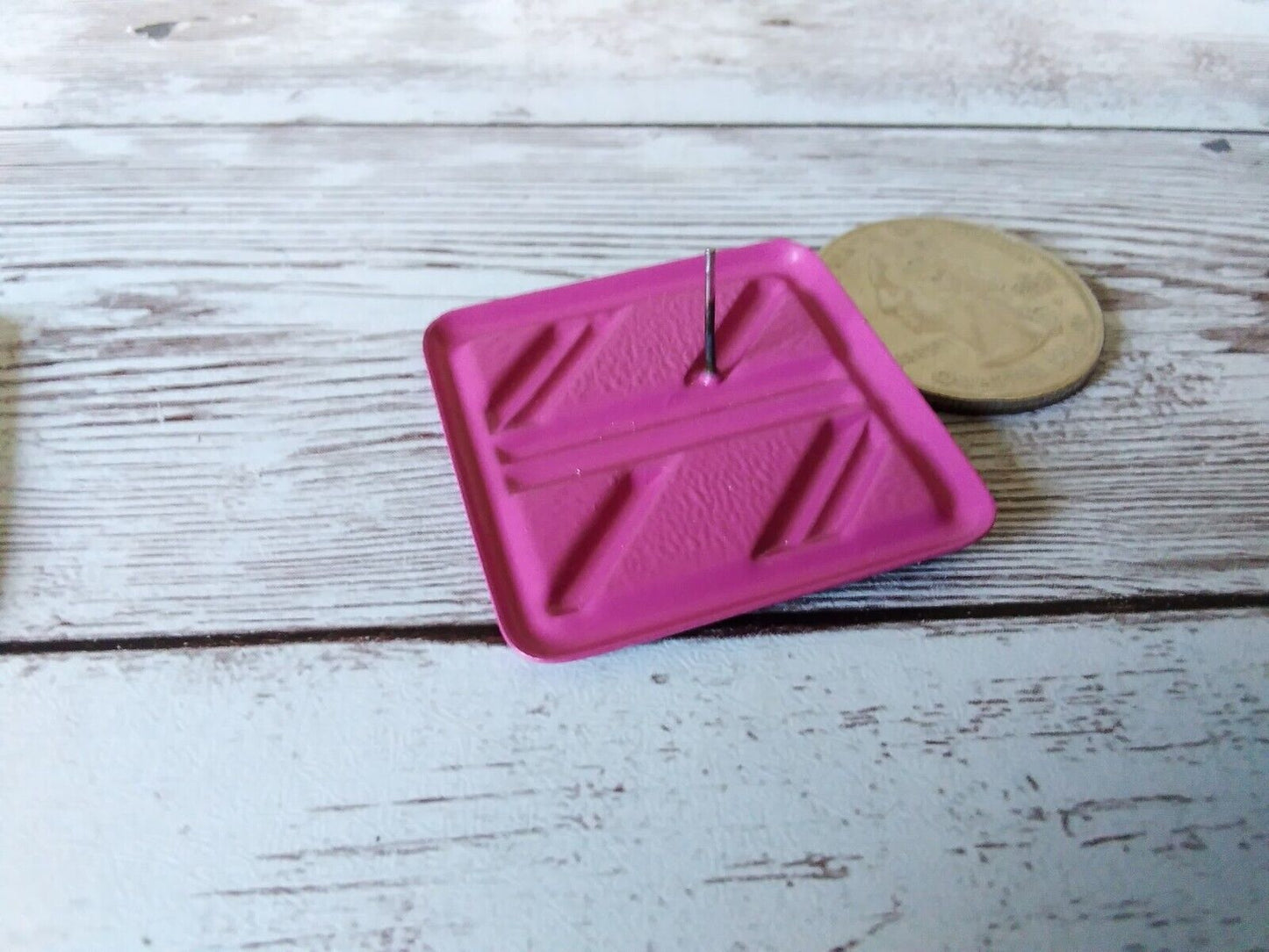 Playful 1980s square earrings in bright pink