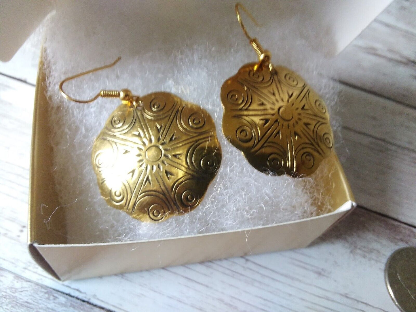 Handcrafted brass earrings made in Thailand