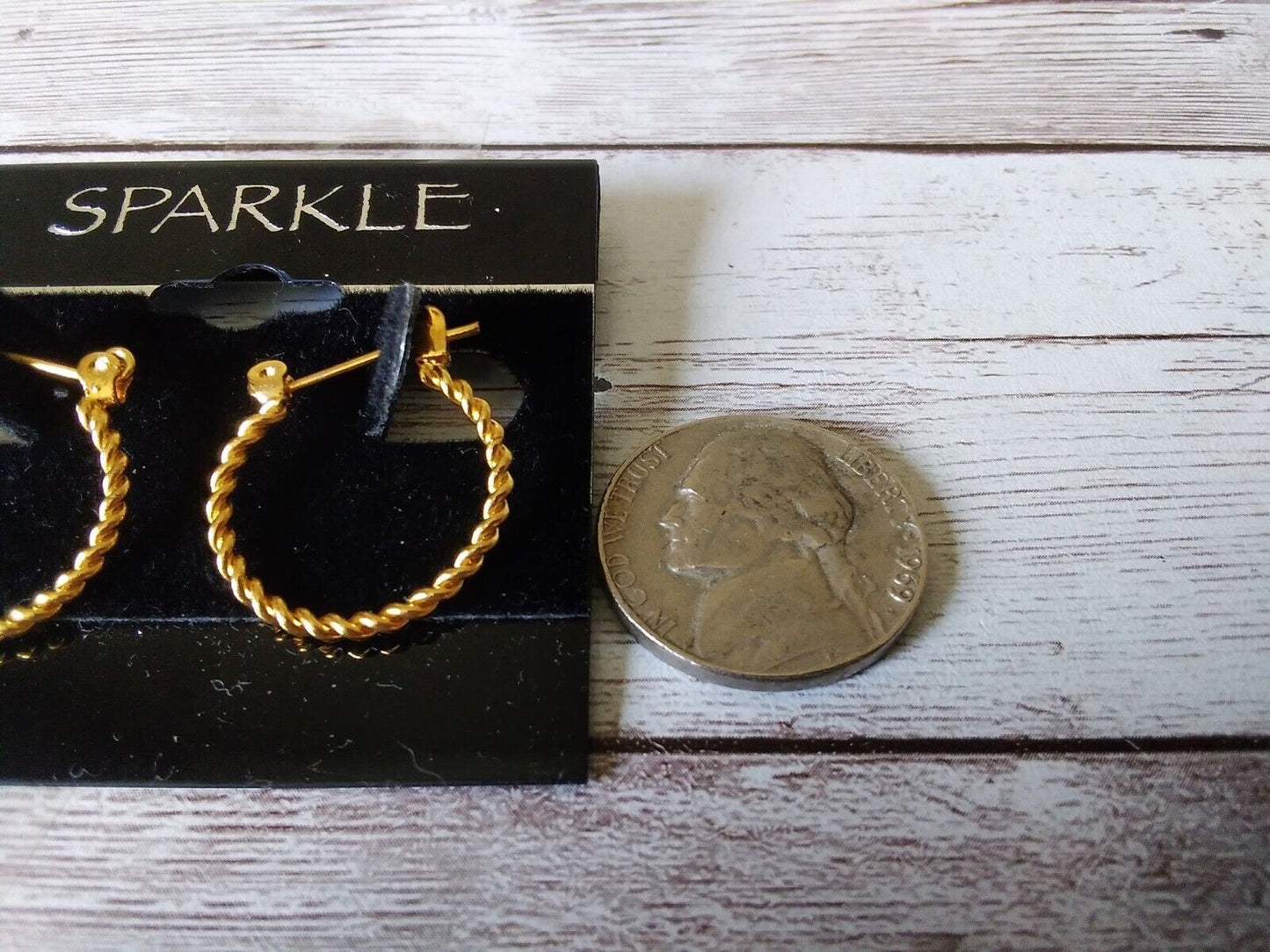 Minimalist gold hoops with lever back closure - about the size of a nickel