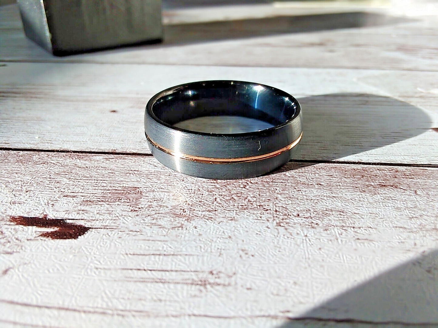 Beveled design and rose gold line on Commanding Tungsten Ring