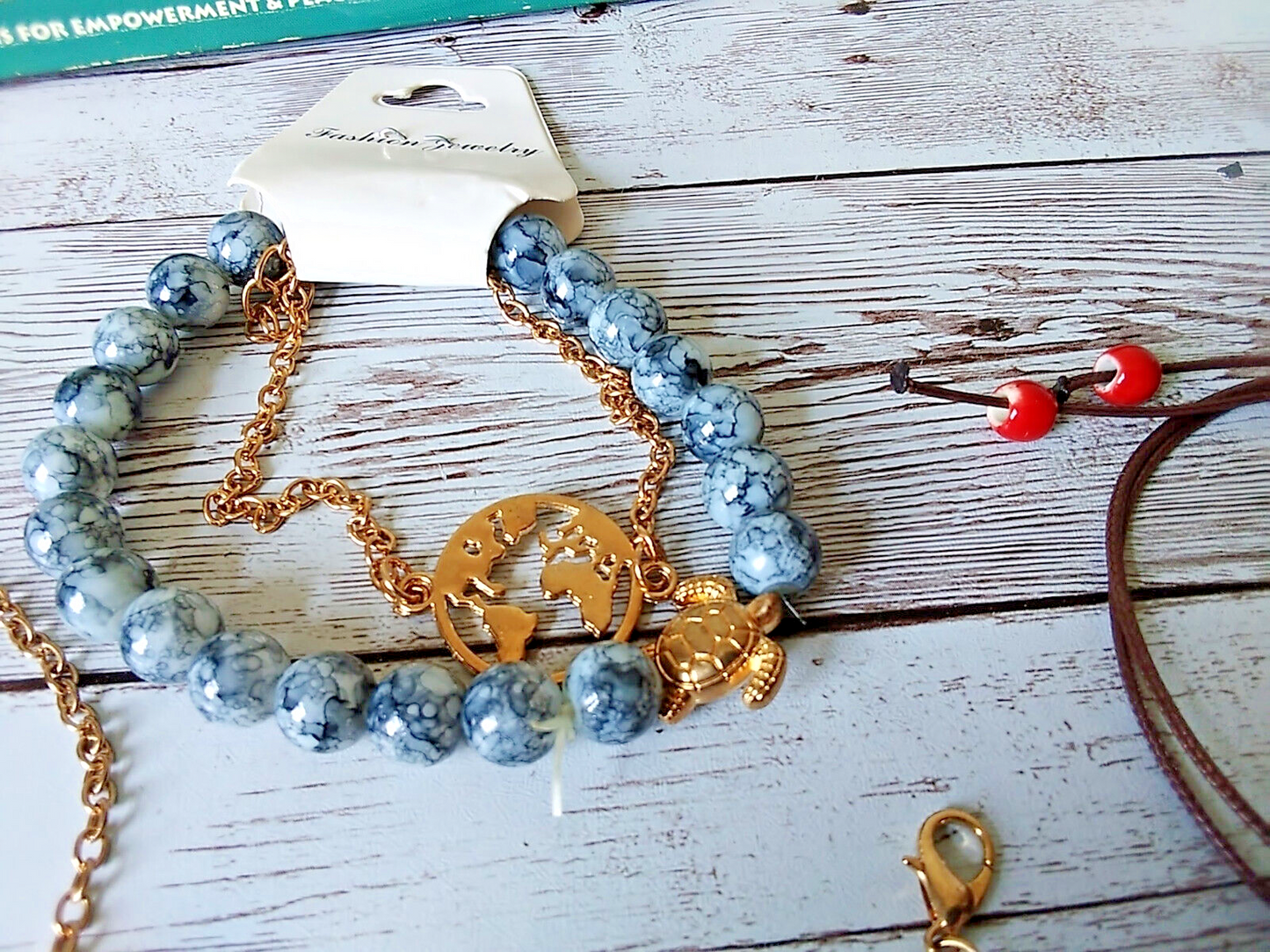 Gold tone and gray stone bracelet stack for spring fashion