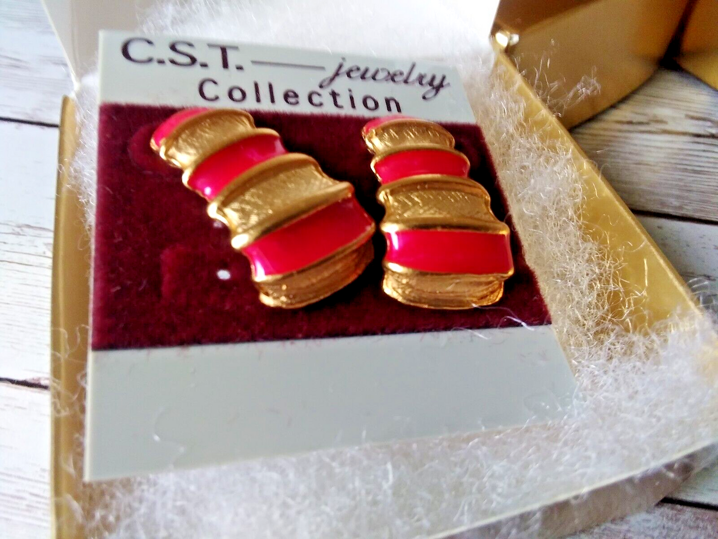 Retro earrings featuring pink and gold stripe design