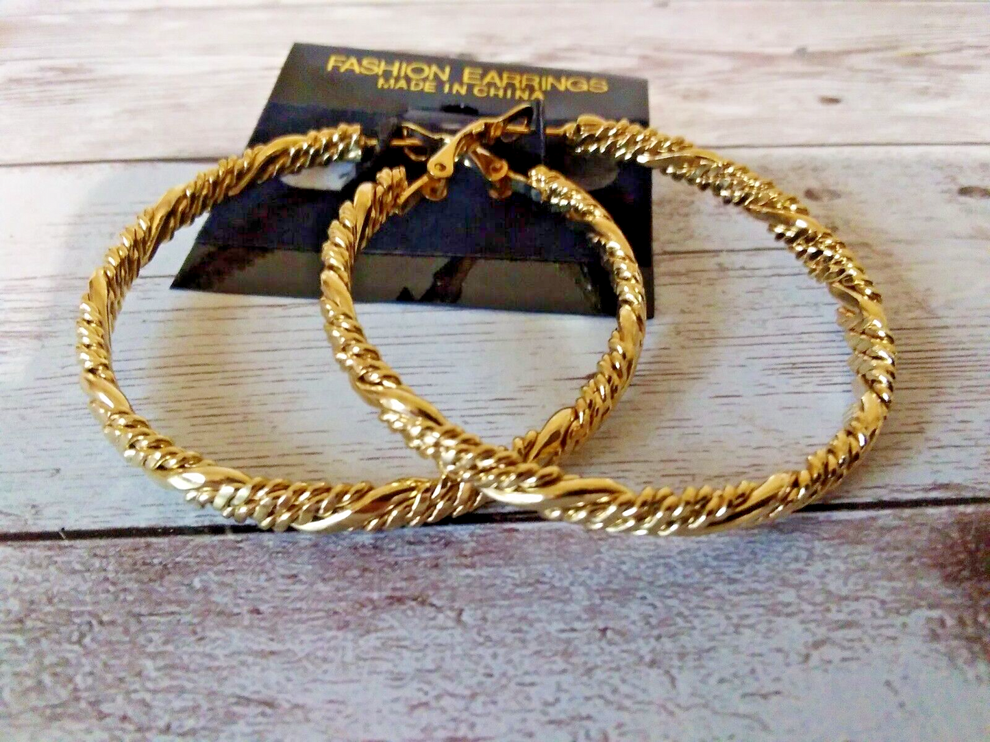 Elegant gold twisted rope earrings, 2 inches diameterGold twisted rope earrings, perfect for any occasion