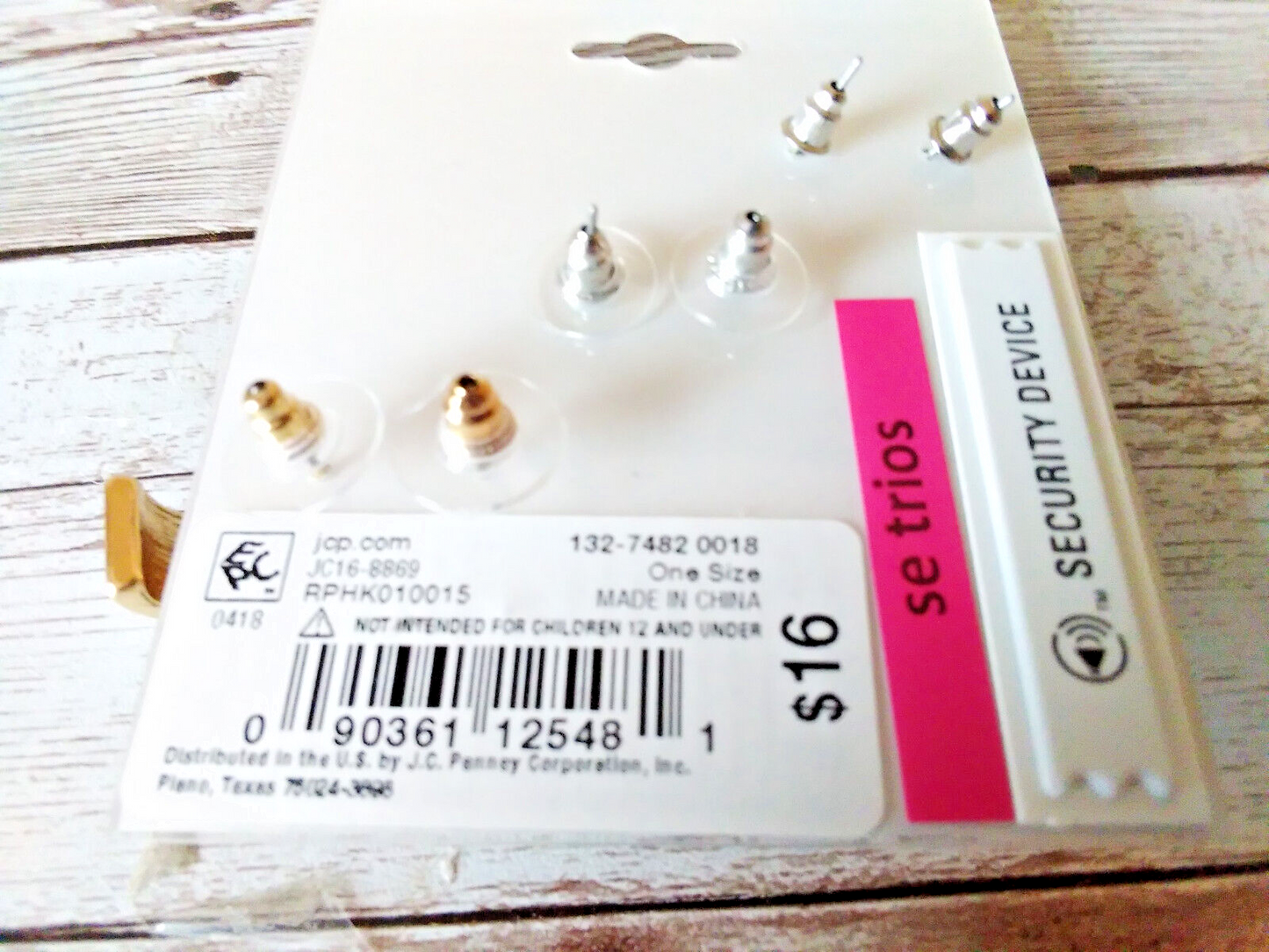 Backside of earring card with $16 tag