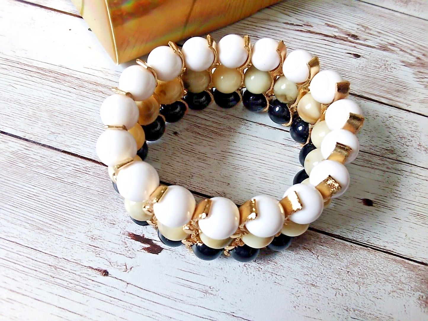 Sophisticated Tan, Black, White, and Gold Beaded Bracelet