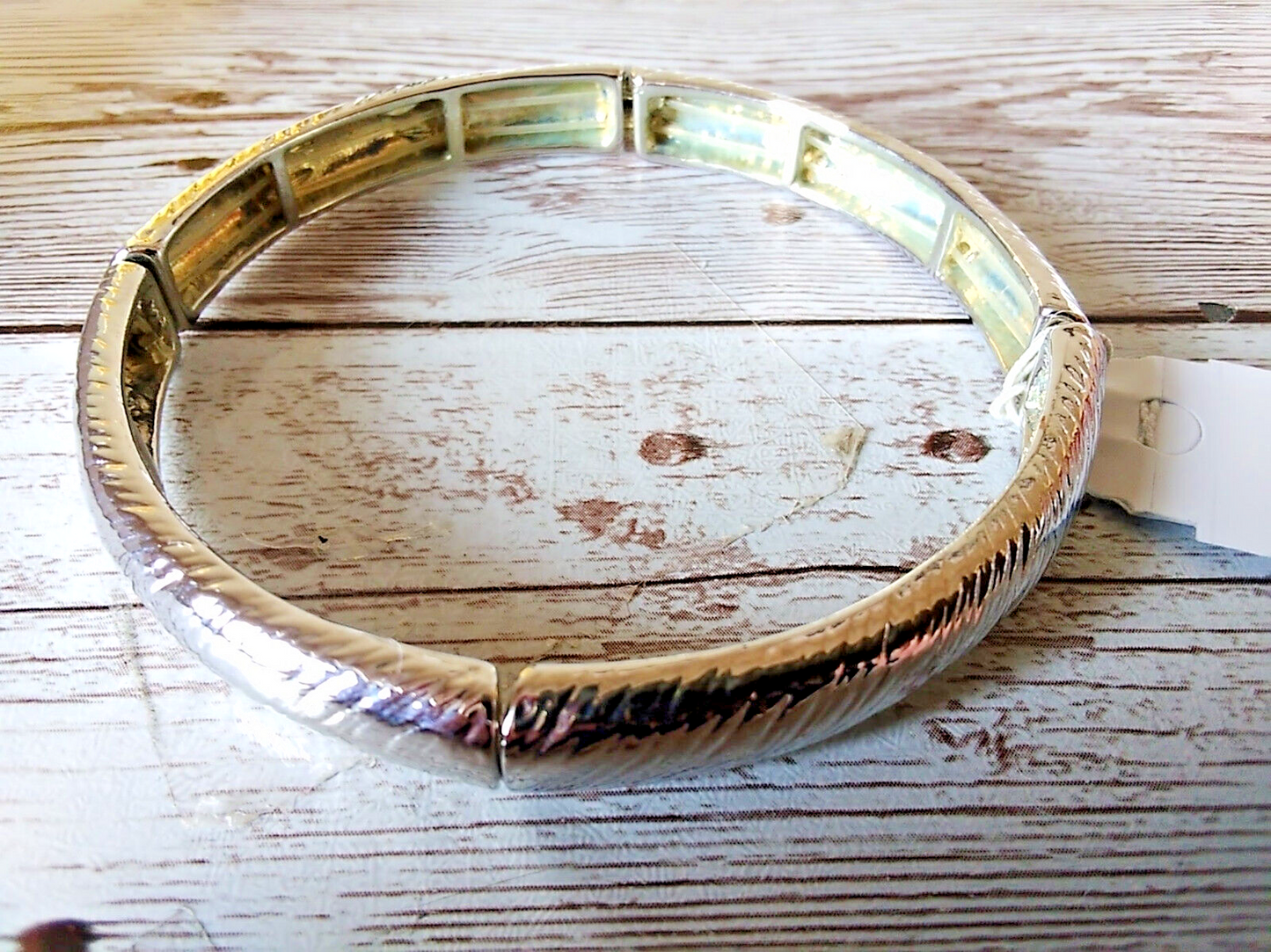 Close-up of Hypoallergenic Stretch Silver Bracelet showing silver-tone finish