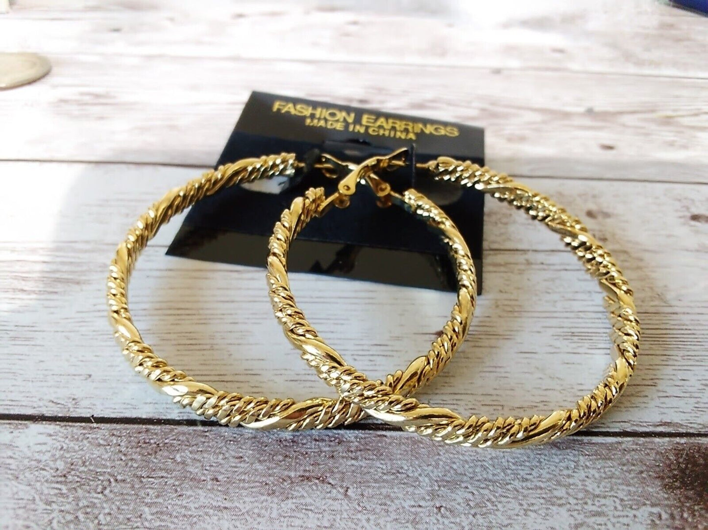 Gold-plated twisted rope earrings with lock design