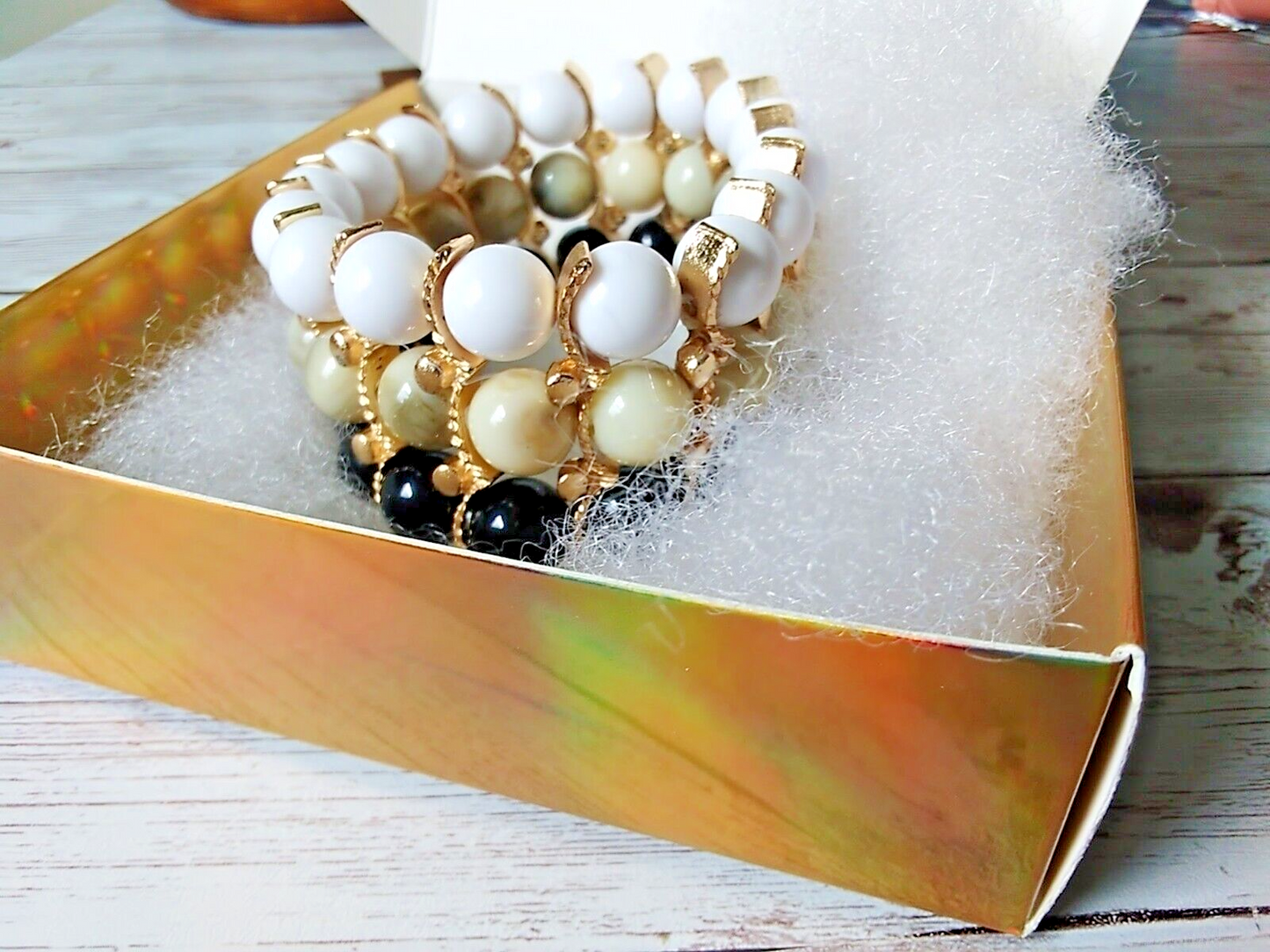 Sophisticated Tan, Black, White, and Gold Beaded Bracelet