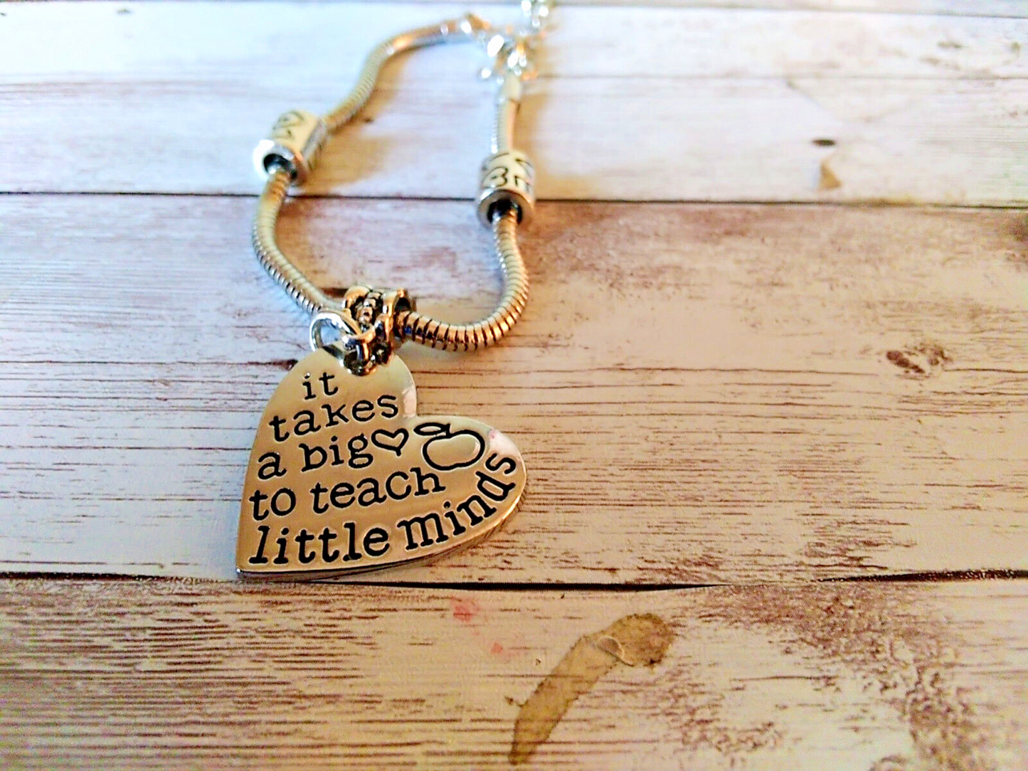 Adjustable Silver-Plated Snake Chain Bracelet with heart charm shown