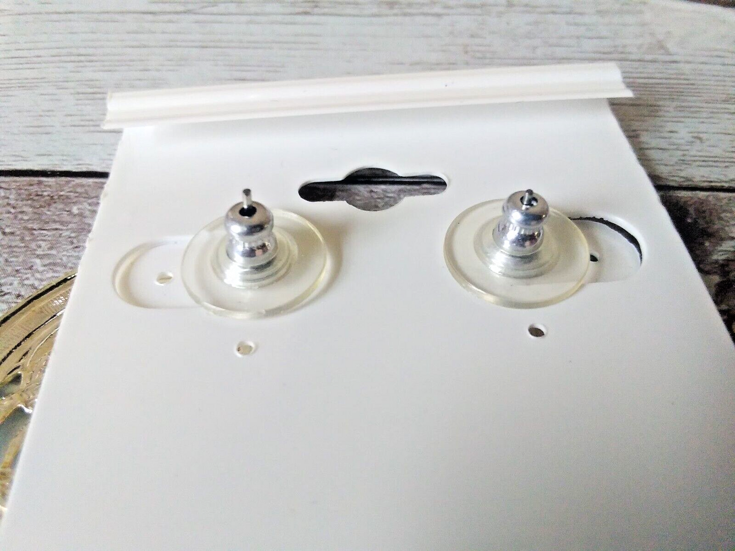 Earring backings on original card