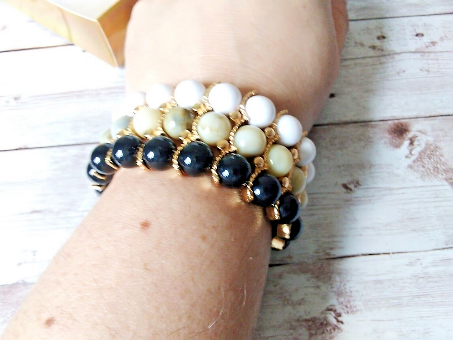 Sophisticated Tan, Black, White, and Gold Beaded Bracelet