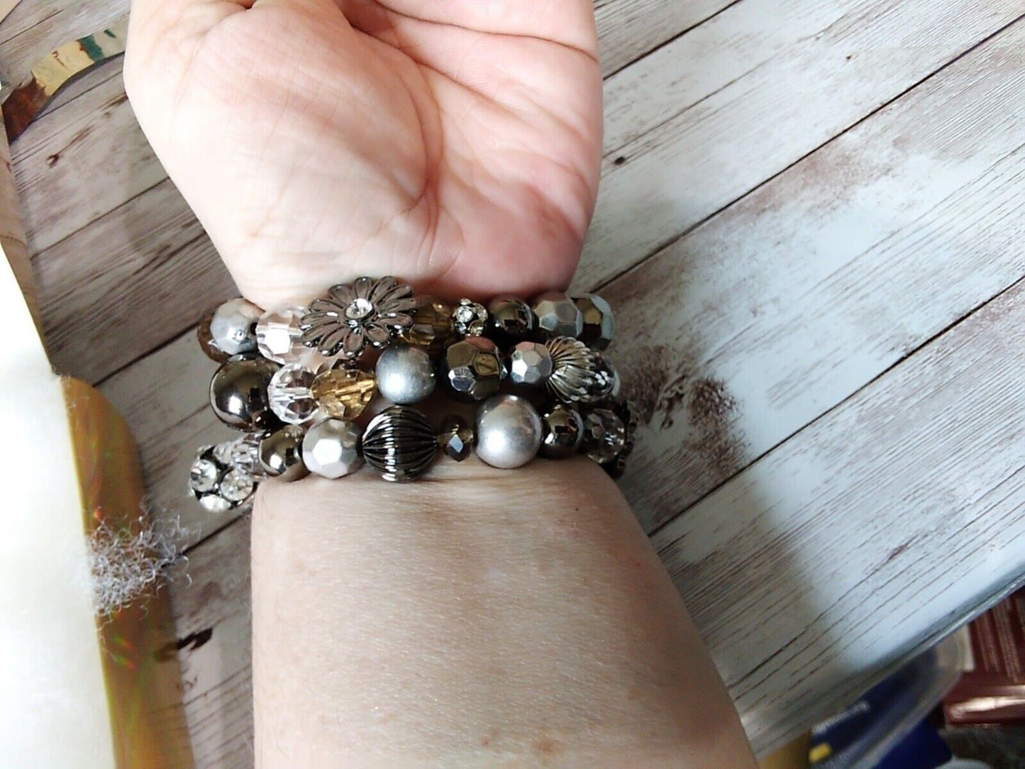 Elegant beaded flower bracelets in silver and gray