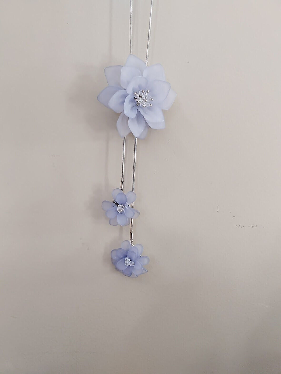 Lavender flower pendant on silver plated necklace