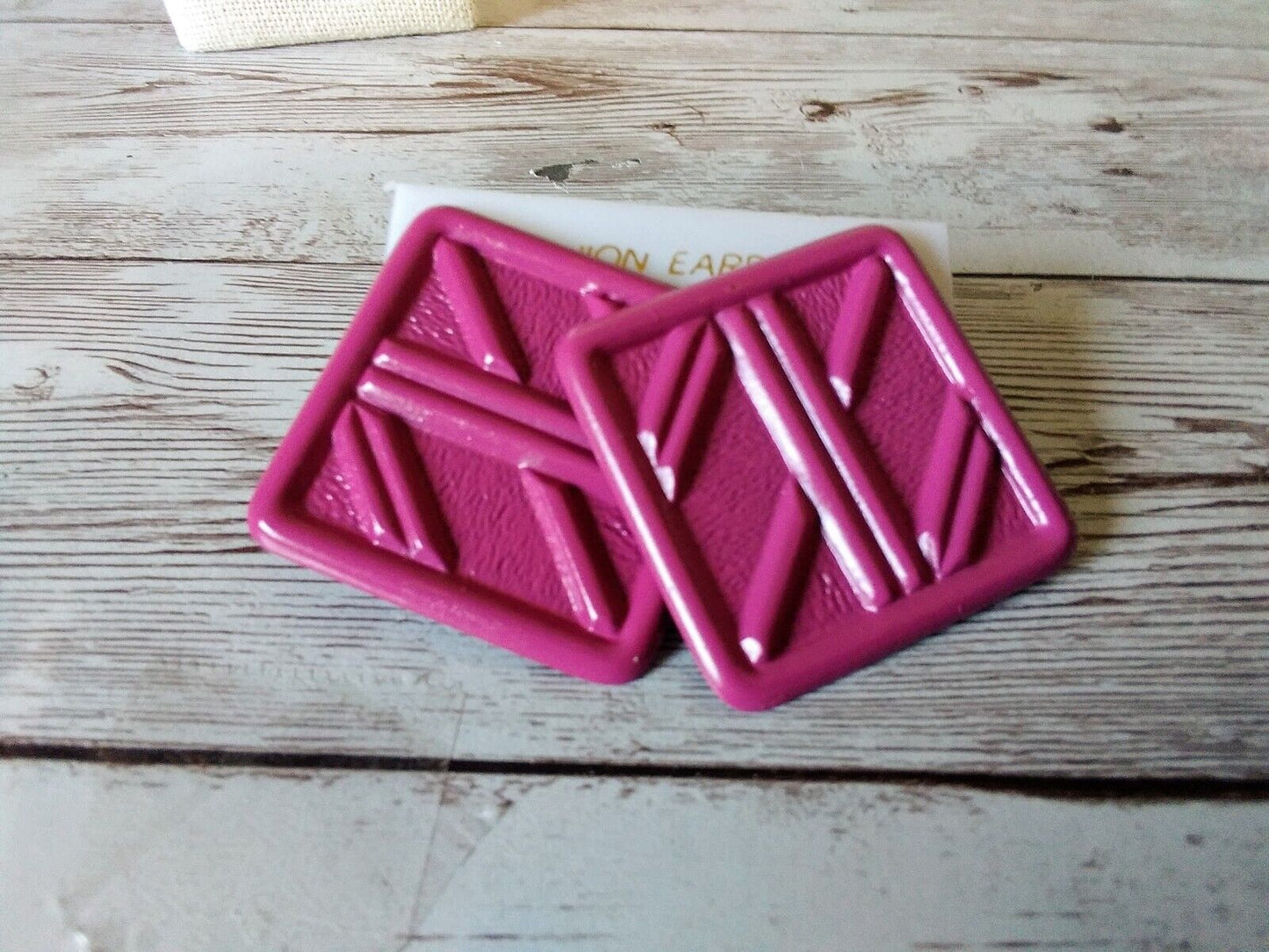 Flashy square earrings from the 1980s in pink