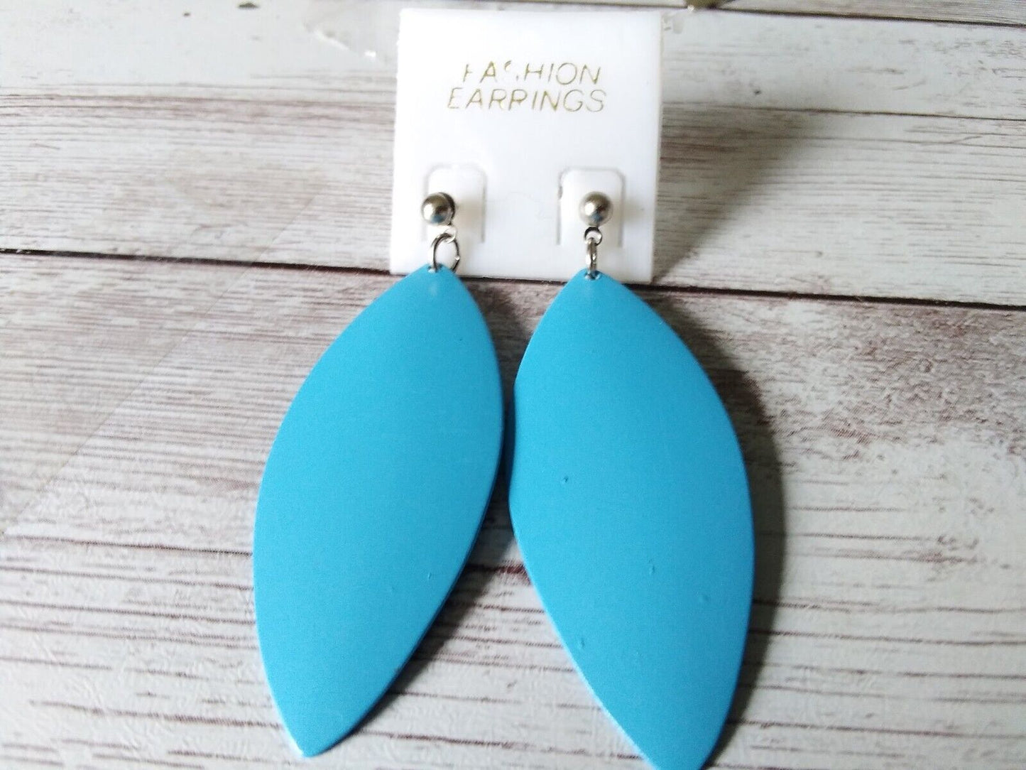 Timeless baby blue leaf earrings from the 1980s