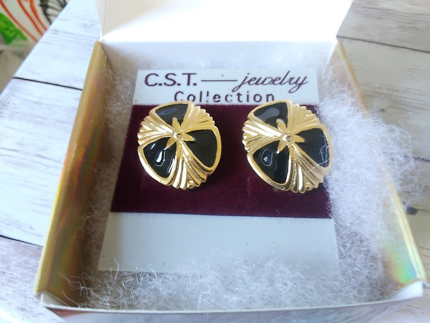 Jetset Elegance Sleek Vintage Black and Gold Oval Earrings