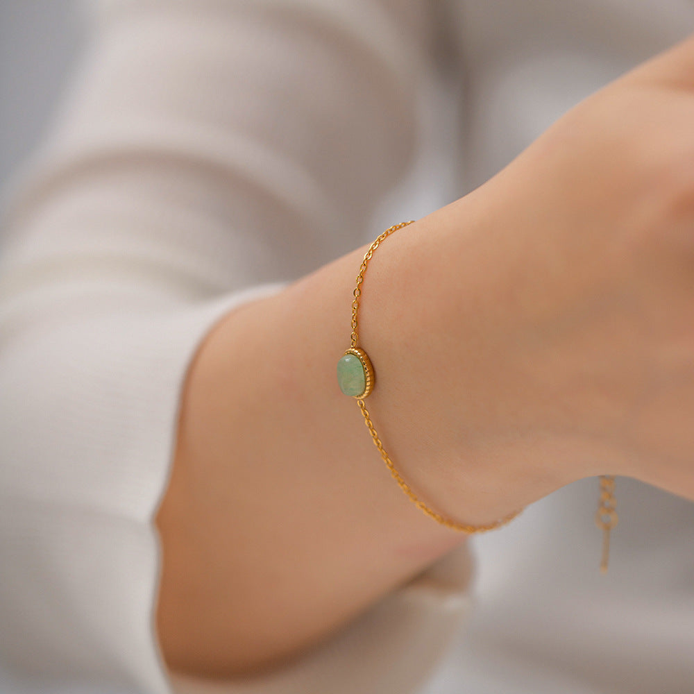 Green aventurine bracelet paired with business casual