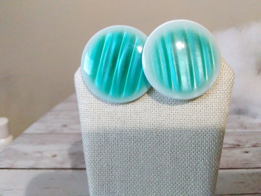 Turquoise circle earrings made from lucite material