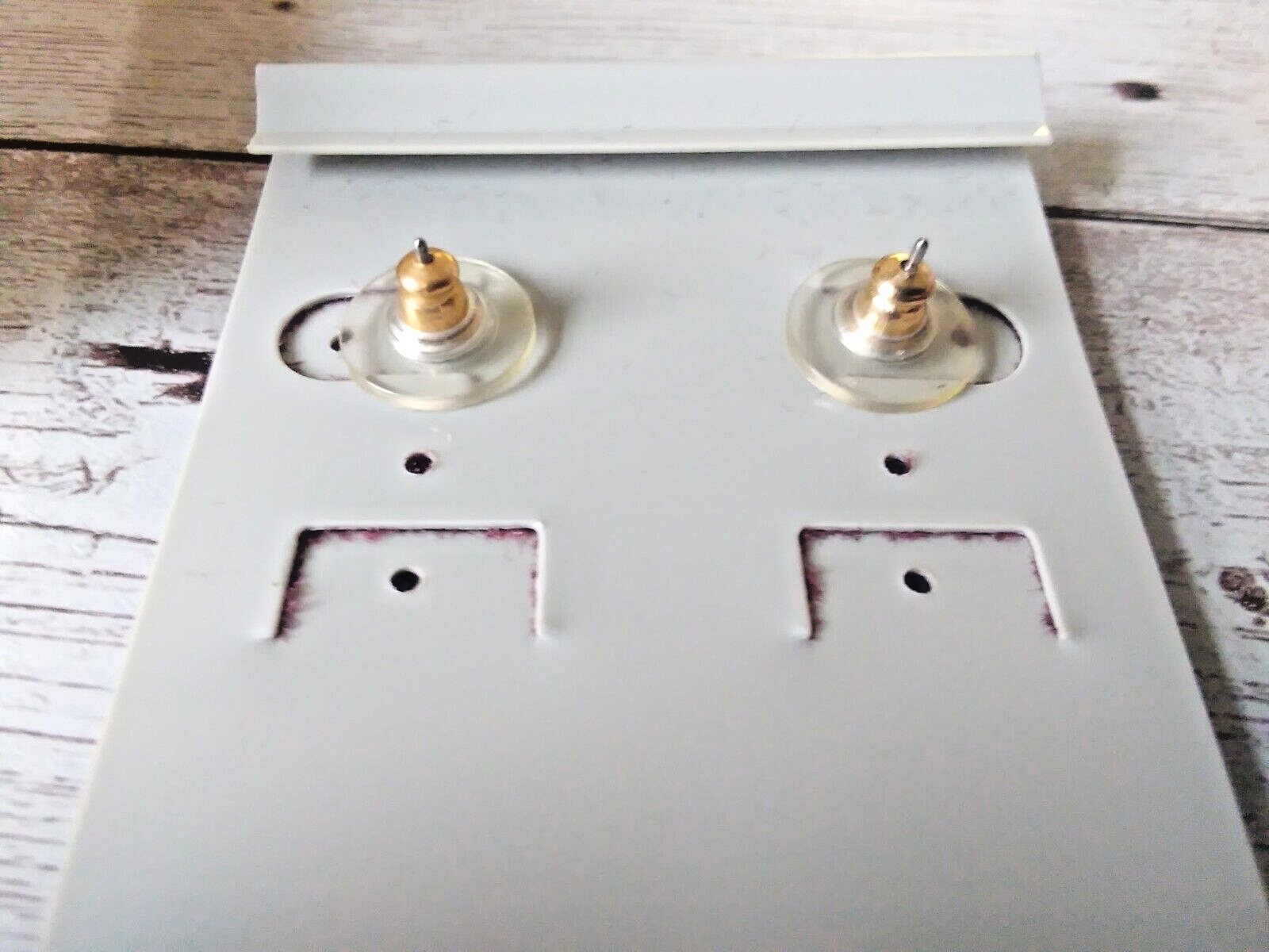 Hypoallergenic red and gold oval earrings with surgical steel posts