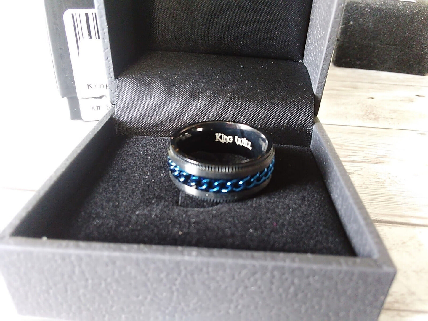Urban Chic: Size 7 Intertwine Stainless Steel Black and Blue Spinner Ring