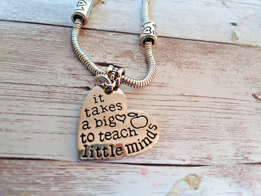 Close-up of Silver-Plated Snake Chain Bracelet clasp and heart charm