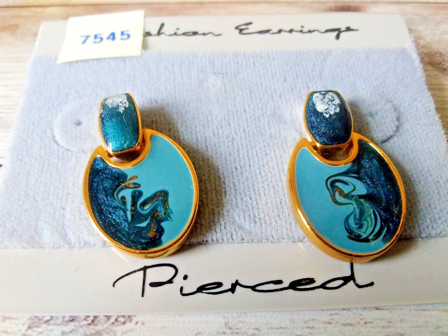 Close-up of Artistic 80s Blue Gold Plated Drop Earrings with vibrant paint