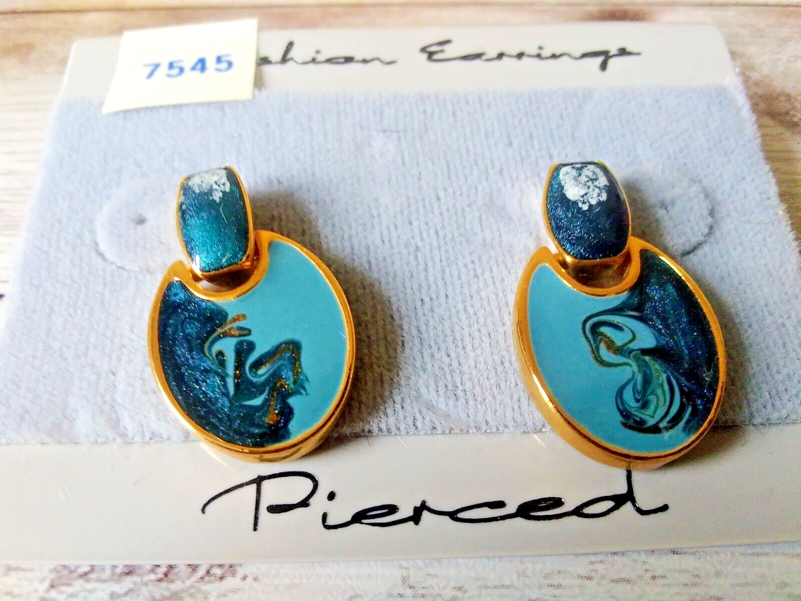 Close-up of Artistic 80s Blue Gold Plated Drop Earrings with vibrant paint