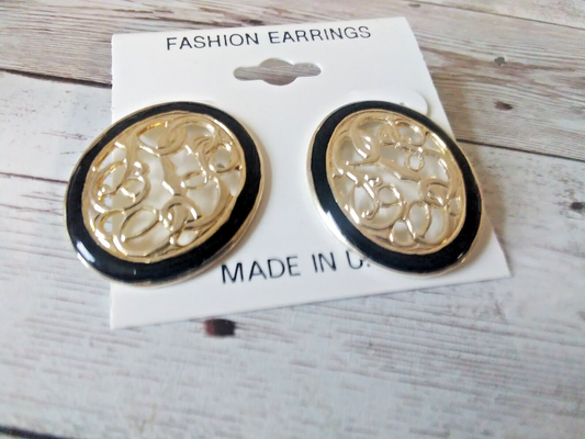 Retro 1980s pierced silver vine earrings close-up