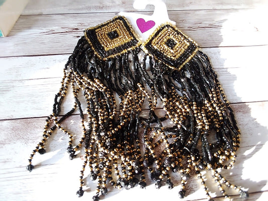 Free-spirited black and gold beaded dangle earrings