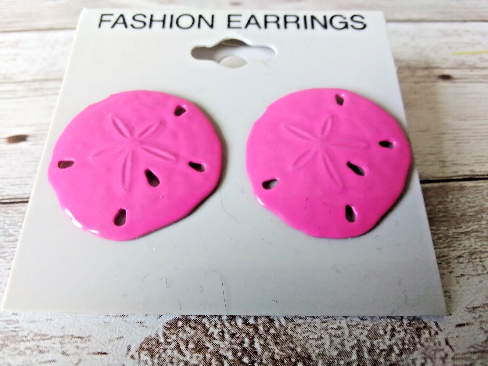 Vintage 1980s Hot Pink Sand Dollar Earrings on a Display Card