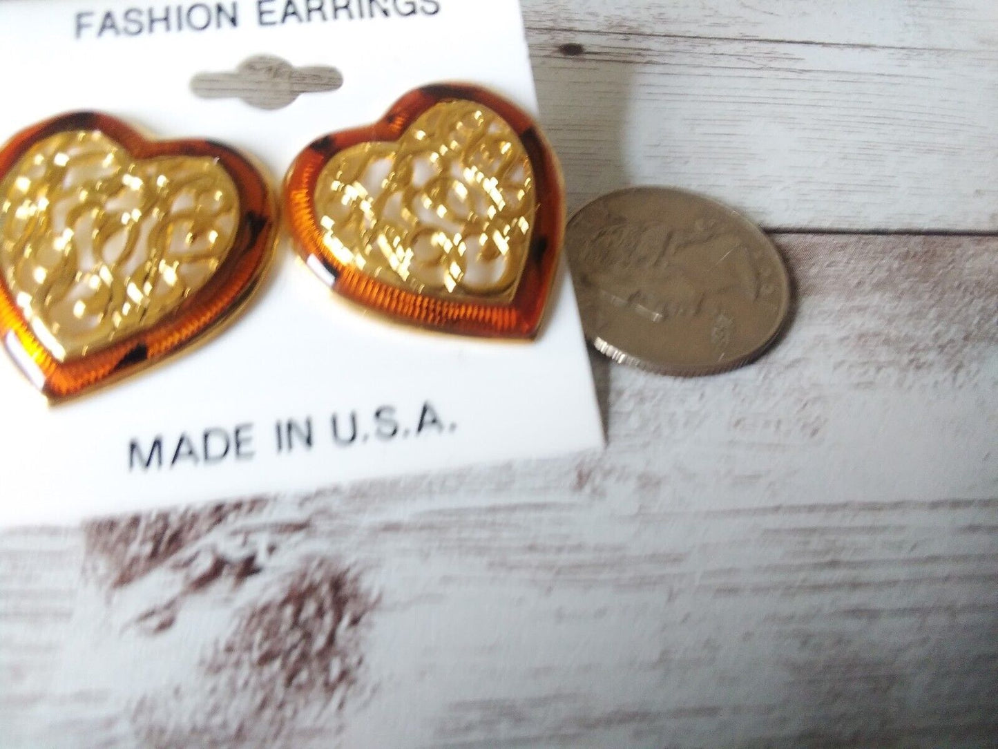 Side view of the large heart-shaped earrings from the 1980s