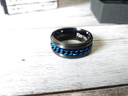 Urban Chic: Size 7 Intertwine Stainless Steel Black and Blue Spinner Ring